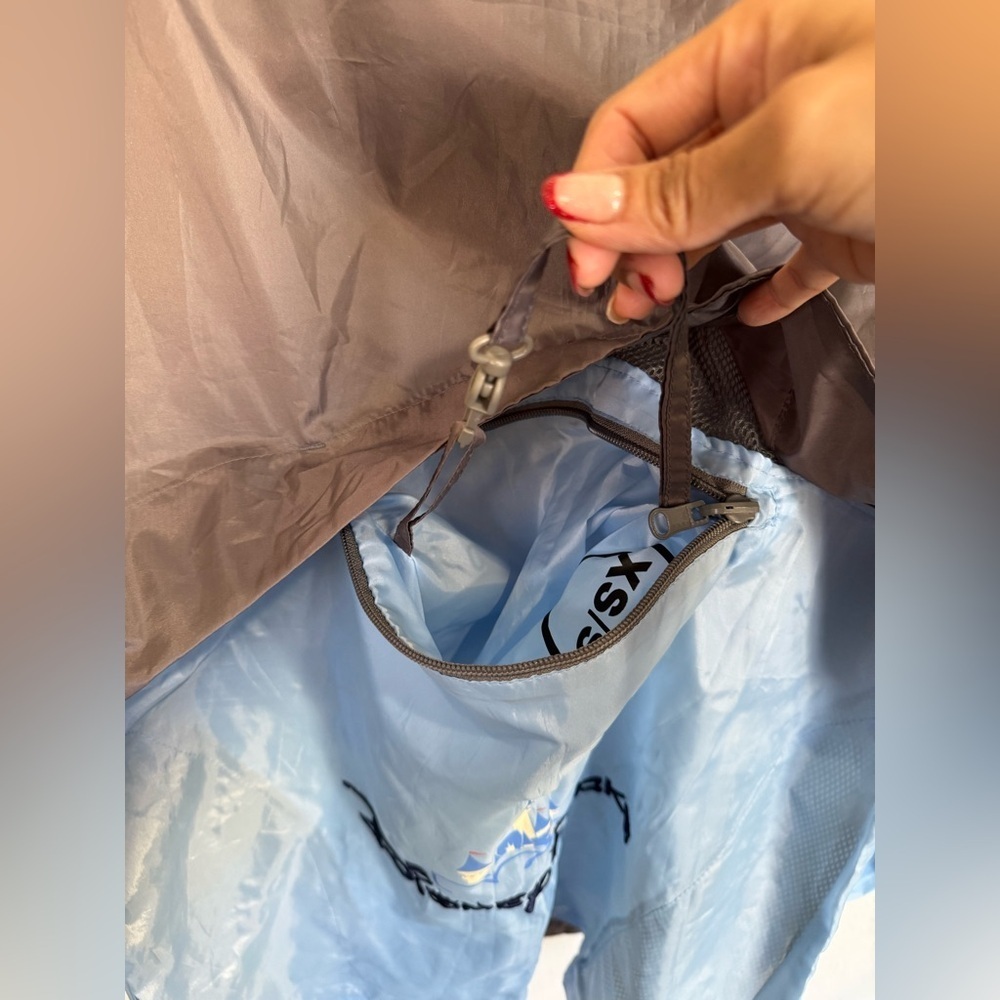 Disney Parks Castle Logo Windbreaker Jacket Blue Gray Packable Oversized XS/S - Picture 4 of 6